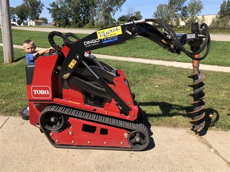 mini skid steer post hole digger|skidsteer post hole digger.